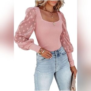 Like New Medium Long Sleeved Shirt with Polkadot sleeves.